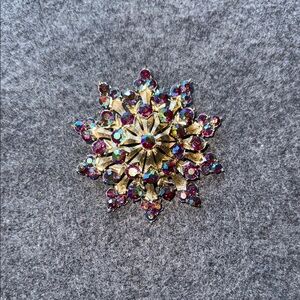 Gold and Purple Starburst Brooch with Crystals‎